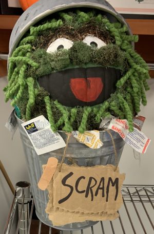 Oscar the Grouch in his trash can pumpkin image